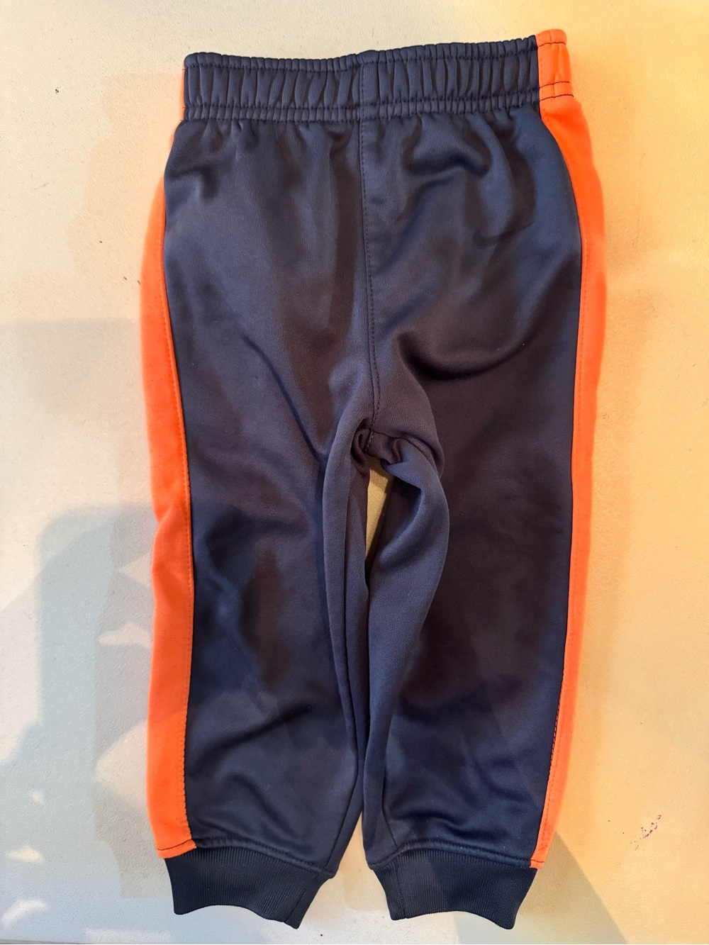 Nike Navy Joggers with Bright Orange Side Panels